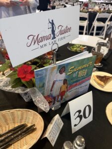 A beautiful arrangement of flowers to welcome us at our table proudly representing Mama Justice for a night of giving!