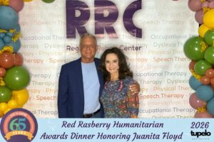 Missy from Mama Justice smiling at the Regional Rehab Center Red Rasberry Humanitarian Award Dinner.